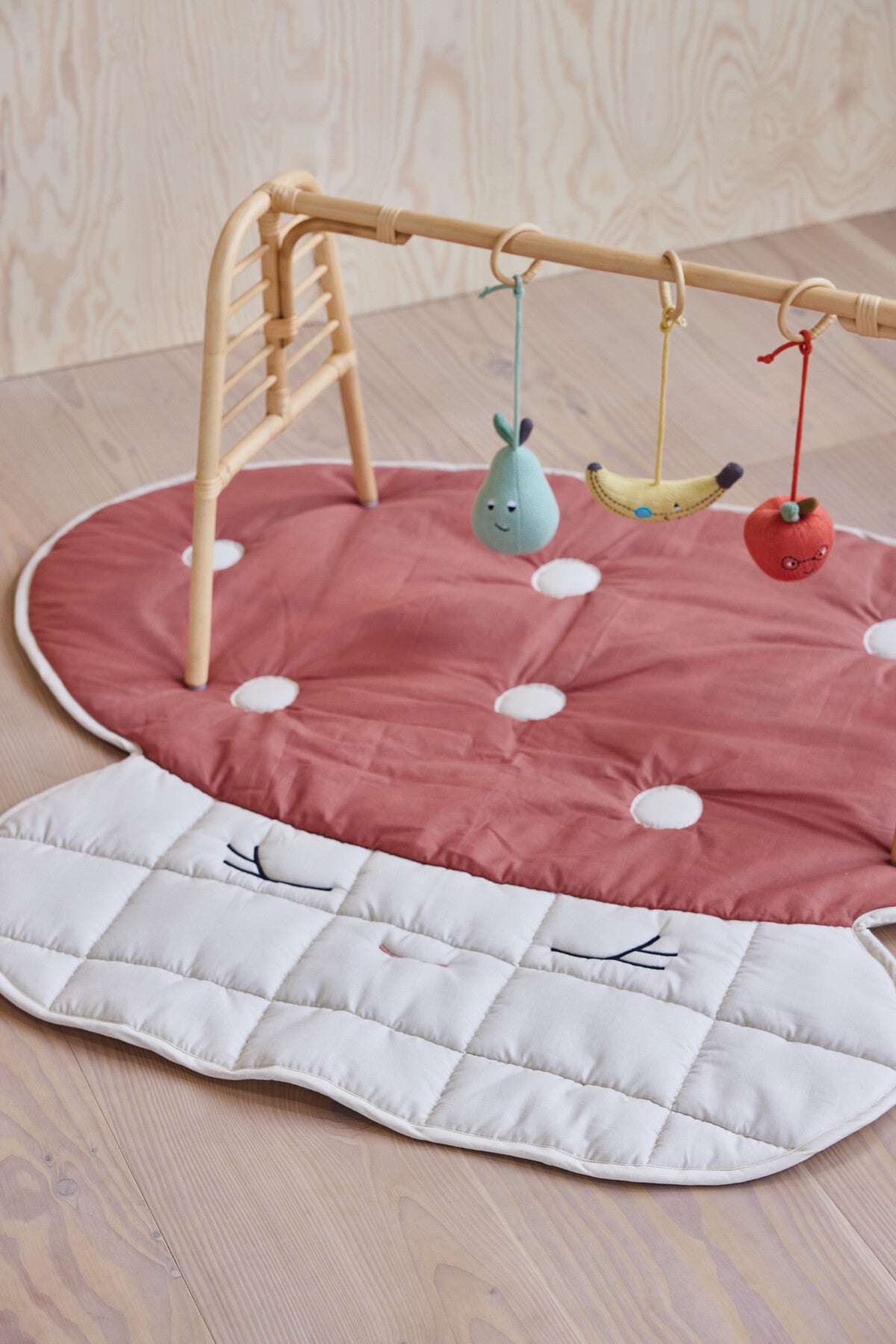 Couverture matelassée à motif de champignons